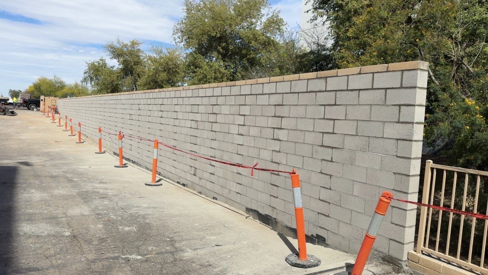 Capped commercial wall, traffic control in place, Phoenix Metro, AZ