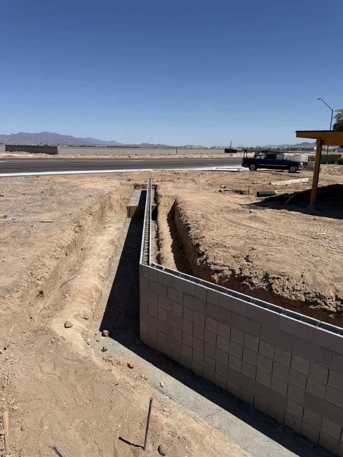 Footing trench and rebar cage, roadside wall, Phoenix Metro, AZ
