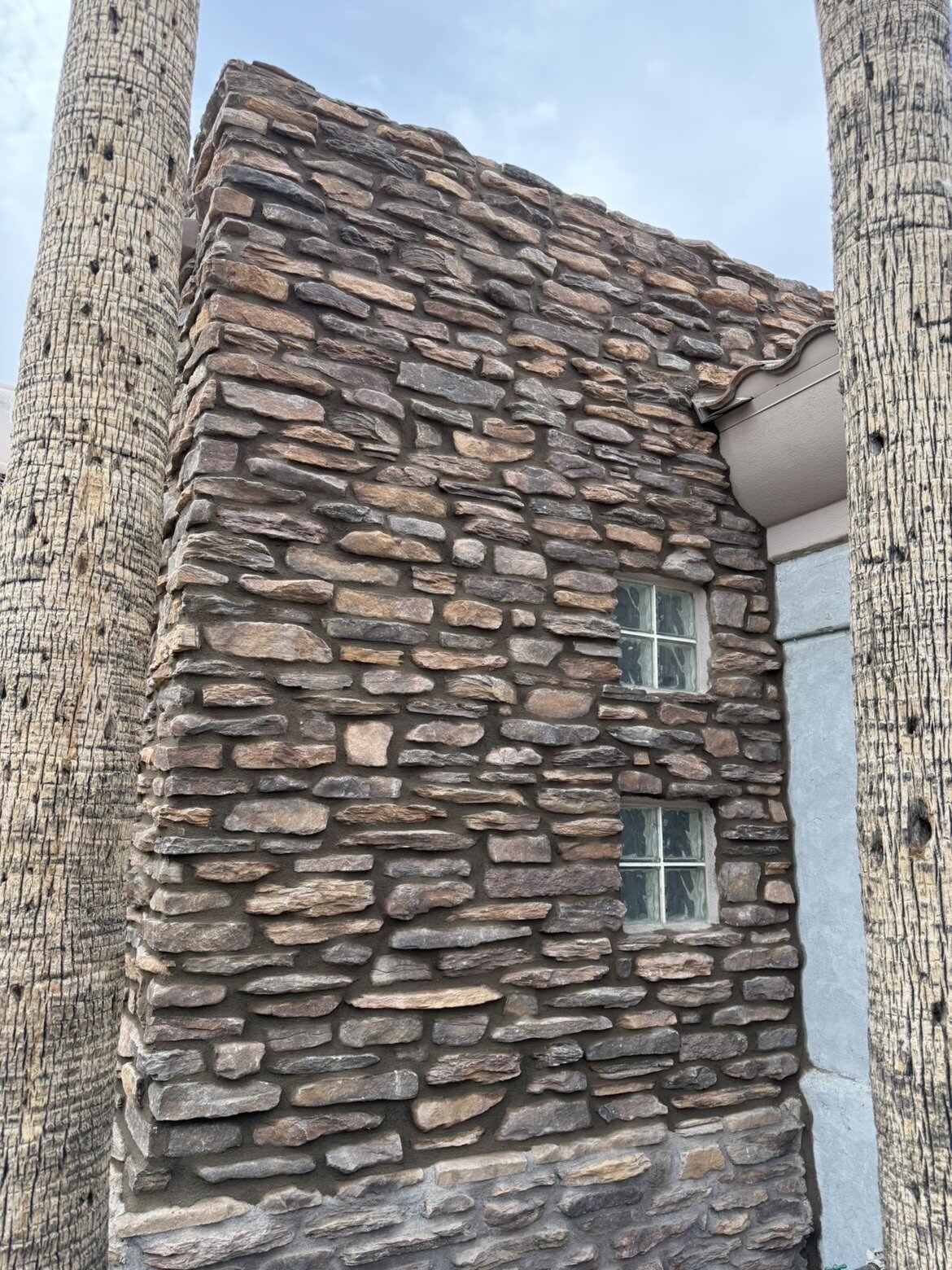 Ledgestone veneer column between the palms, Phoenix Metro, AZ
